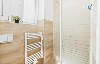 Ein Badezimmer in der Unterkunft BEGE APARTMENTS MyWork Apartment