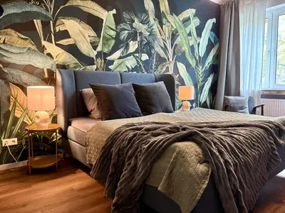 Ein Bett oder Betten in einem Zimmer der Unterkunft My happy place - Apartment mit Sauna & Whirlpool
