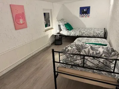 Ein Bett oder Betten in einem Zimmer der Unterkunft Kleines Wiesel