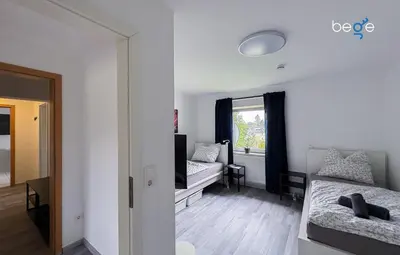 Ein Bett oder Betten in einem Zimmer der Unterkunft BEGE APARTMENTS Your Cozy Flat