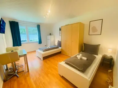 Ein Bett oder Betten in einem Zimmer der Unterkunft SASI HOMES - WorkBase