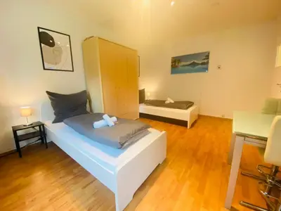 Ein Bett oder Betten in einem Zimmer der Unterkunft SASI HOMES - WorkBase
