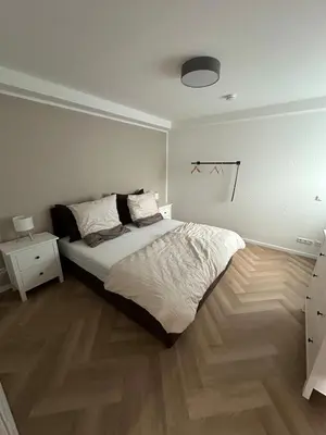 Ein Bett oder Betten in einem Zimmer der Unterkunft FeWo auf dem Kettwiger Bögel