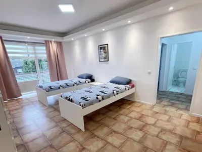 Ein Bett oder Betten in einem Zimmer der Unterkunft Monteurwohnung mit Balkon in Duisburg