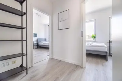 Ein Bett oder Betten in einem Zimmer der Unterkunft Workers Home W136 l 2 Schlafzimmer für 4 Personen