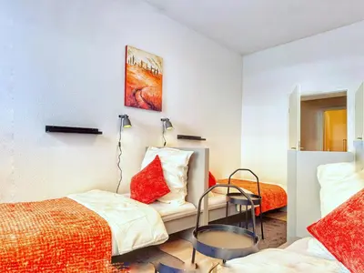 Ein Bett oder Betten in einem Zimmer der Unterkunft Ring-Apartments Kompakt - Gelsenkirchen Zentrum