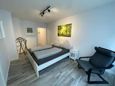 Ein Bett oder Betten in einem Zimmer der Unterkunft Ferienwohnung Nelly