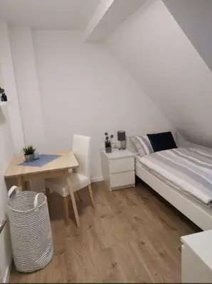 Ein Bett oder Betten in einem Zimmer der Unterkunft R&A Monteurzimmer