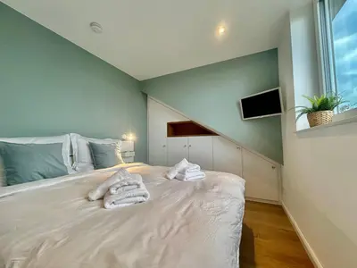 Ein Bett oder Betten in einem Zimmer der Unterkunft Apartment in fußläufiger Nähe zu Airport-Messe 2
