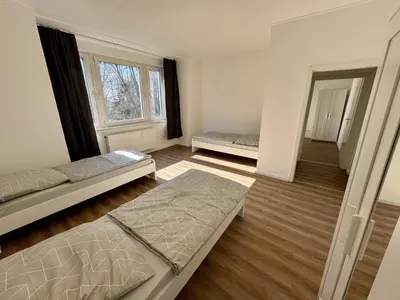 Ein Bett oder Betten in einem Zimmer der Unterkunft Spacious apartment in Solingen with Perfect connection