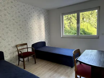 Ein Bett oder Betten in einem Zimmer der Unterkunft Residenz Elegance