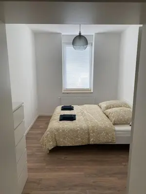 Ein Bett oder Betten in einem Zimmer der Unterkunft Heart of Essen