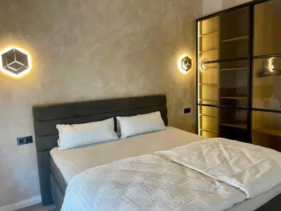 Ein Bett oder Betten in einem Zimmer der Unterkunft Aura Apartament Oberhausen