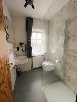 Ein Badezimmer in der Unterkunft Landhaus Sassenhof