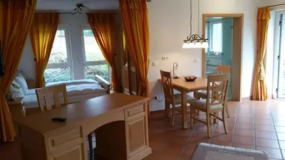 Ein Sitzbereich in der Unterkunft Landhaus Sassenhof