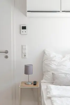 Ein Bett oder Betten in einem Zimmer der Unterkunft SpaceStays Bunker Sweet Messe WI-FI TV