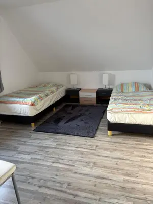 Ein Bett oder Betten in einem Zimmer der Unterkunft Ferienwohnung Werne