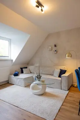 Ein Sitzbereich in der Unterkunft Stilvolles Apartment Nähe Messe & Uniklinikum