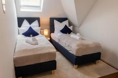 Ein Bett oder Betten in einem Zimmer der Unterkunft Stilvolles Apartment Nähe Messe & Uniklinikum