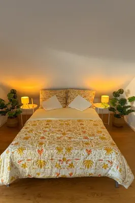 Ein Bett oder Betten in einem Zimmer der Unterkunft Ruheoase unterm Dach
