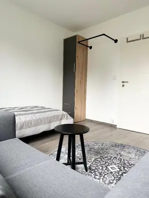 Ein Sitzbereich in der Unterkunft Messe Apartment - Near Trade Fair Grounds