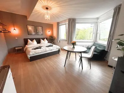 Ein Bett oder Betten in einem Zimmer der Unterkunft Barrier-Free Studio Near Messe