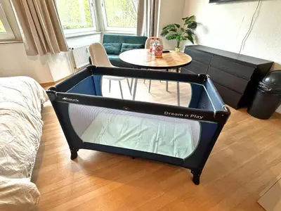 Ein Bett oder Betten in einem Zimmer der Unterkunft Barrier-Free Studio Near Messe