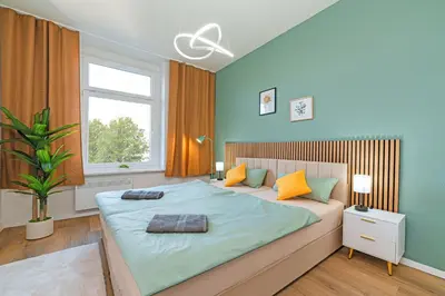 Ein Bett oder Betten in einem Zimmer der Unterkunft Perfect for 6 Guests in Wuppertal - Suite - Netflix - Smart Home