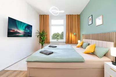 Ein Bett oder Betten in einem Zimmer der Unterkunft Perfect for 6 Guests in Wuppertal - Suite - Netflix - Smart Home