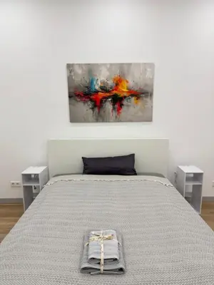 Ein Bett oder Betten in einem Zimmer der Unterkunft Exklusives City-Zimmer, Gemeinschaftsbad und Küche