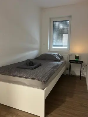 Ein Bett oder Betten in einem Zimmer der Unterkunft SleepInn Recklinghausen