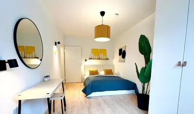 Ein Bett oder Betten in einem Zimmer der Unterkunft Neu und modern, Nähe Hbf, Ddorf, CNG , Lift und Parkplatz