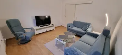 Ein Sitzbereich in der Unterkunft Charmante, ruhige Erdgeschosswohnung mit Balkon