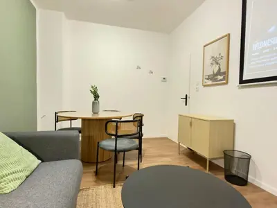 Ein Sitzbereich in der Unterkunft Stylish City Apartment mit Beamer & Balkon Zentral