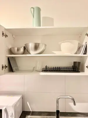 Küche/Küchenzeile in der Unterkunft Stylish City Apartment mit Beamer & Balkon Zentral