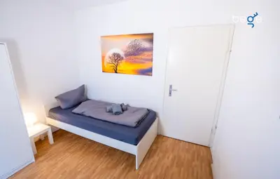 Ein Bett oder Betten in einem Zimmer der Unterkunft BEGE APARTMENTS FlatLab