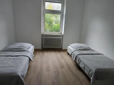 Ein Bett oder Betten in einem Zimmer der Unterkunft Central location close to Essen Hbf
