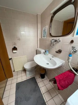 Ein Badezimmer in der Unterkunft Gemütliche Dachgeschoss Wohnung