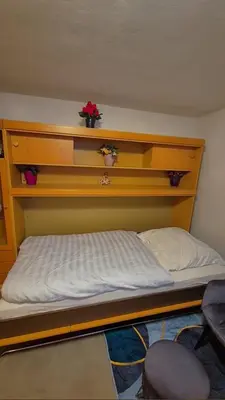 Ein Bett oder Betten in einem Zimmer der Unterkunft Einzelzimmer Wohnkeller in Oberhausen Alstaden für 3 Personen ohne Küche, Gefrierschrank und Mikrowelle Vorhanden!!