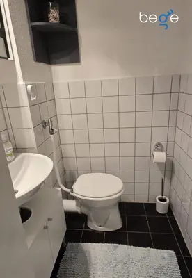 Ein Badezimmer in der Unterkunft BEGE APARTMENTS WorkHaus