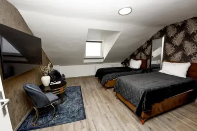 Ein Bett oder Betten in einem Zimmer der Unterkunft Haus Thomas Deluxe 4