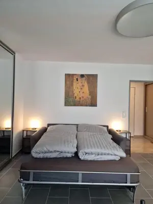 Ein Bett oder Betten in einem Zimmer der Unterkunft Linda's Appartement