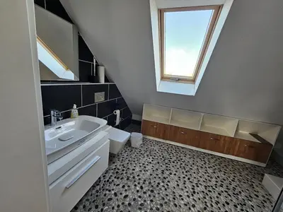 Grundriss der Unterkunft Stylish top floor apartment with garden view