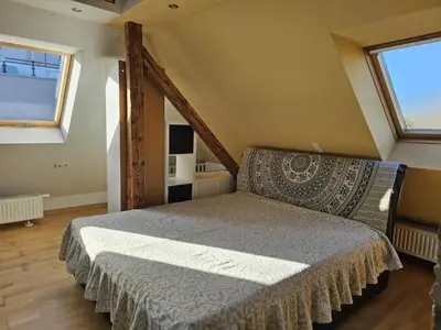 Grundriss der Unterkunft Stylish top floor apartment with garden view