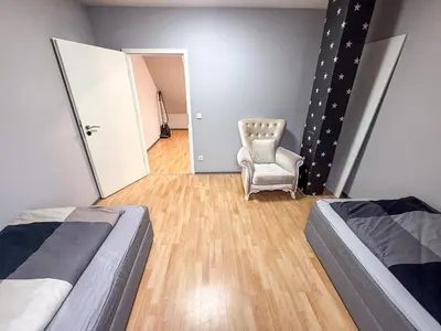 Ein Sitzbereich in der Unterkunft Ruhr Business Apartments Essen Apartment mit 7 Einzelbetten