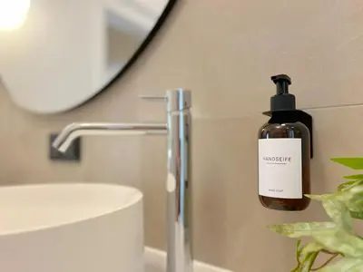 Ein Badezimmer in der Unterkunft Seestadt Apartment I Sauna I Parkplatz I Zentral