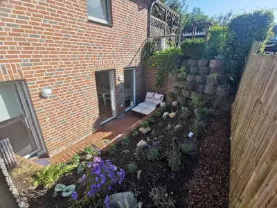 Ein Garten an der Unterkunft Ferienwohnung Am Heimathof