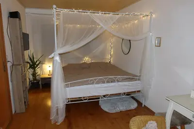 Ein Bett oder Betten in einem Zimmer der Unterkunft Family-friendly oasis with sauna & terrace