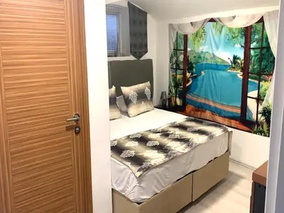 Ein Bett oder Betten in einem Zimmer der Unterkunft Apartment in Oberhausen near Scenic Lake