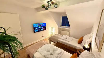 Ein Bett oder Betten in einem Zimmer der Unterkunft Copper Loft - Rüttenscheid, Messe, zentral